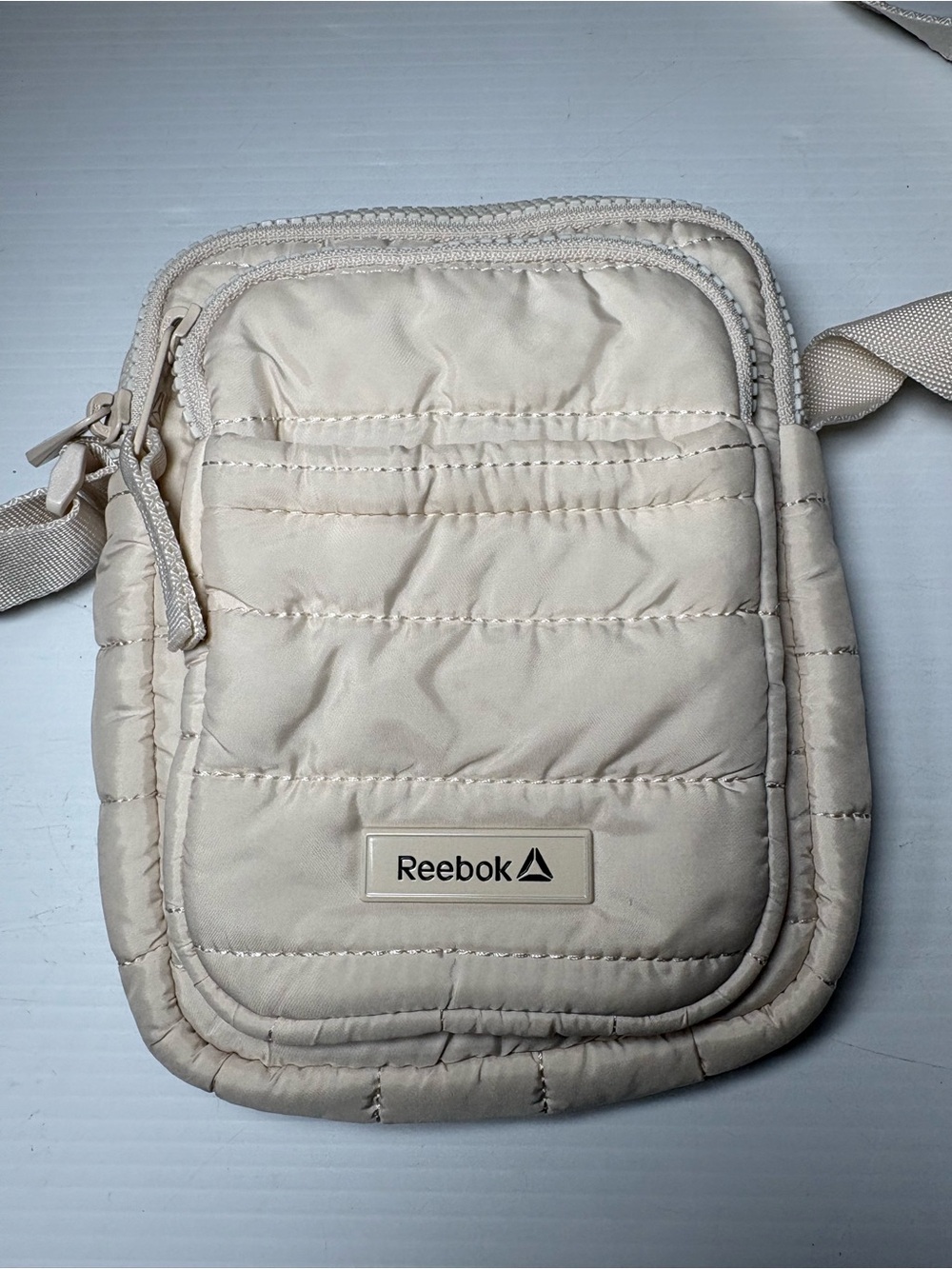 Reebok Quilted Crossbody Bag in Cream
